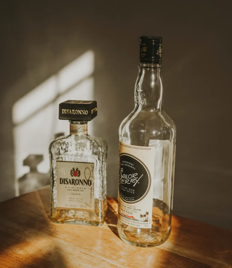 Tequila bottle with serving glass